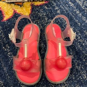 Mini Melissa Velcro sandal with lollipop. Pink and clear color. Size 10